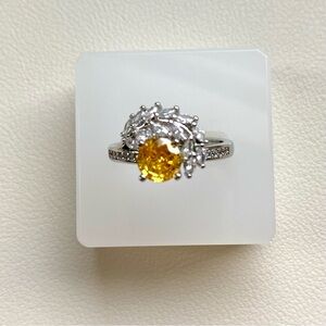Elegant Silver and Yellow Gemstone Ring